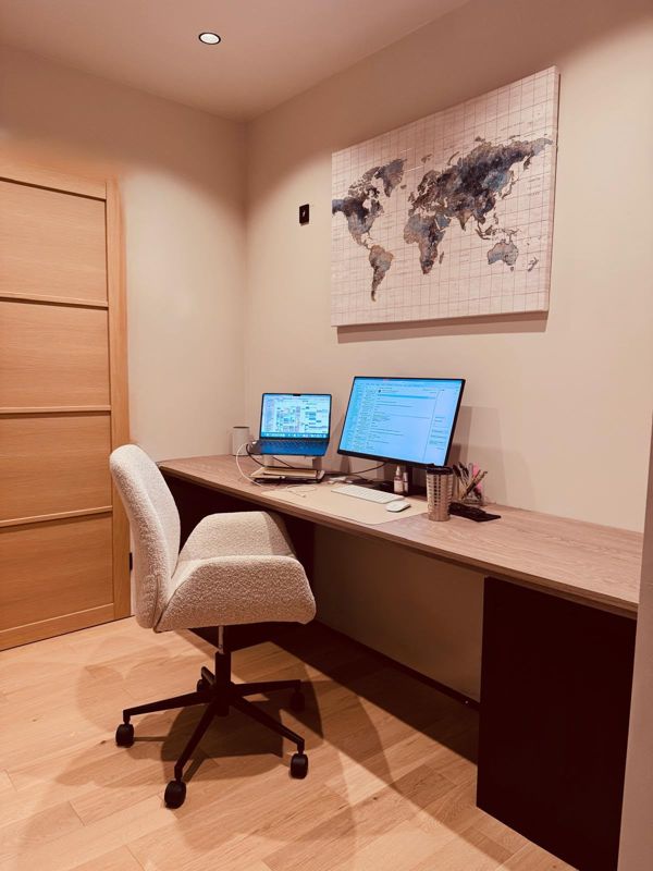 Built-in home office desk with oak door and light oak floor