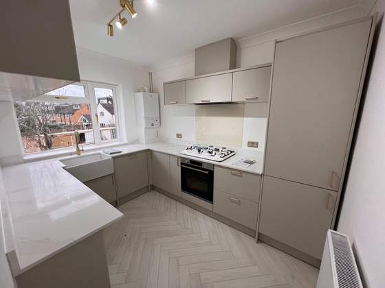 Grey kitchen with herringbone floor